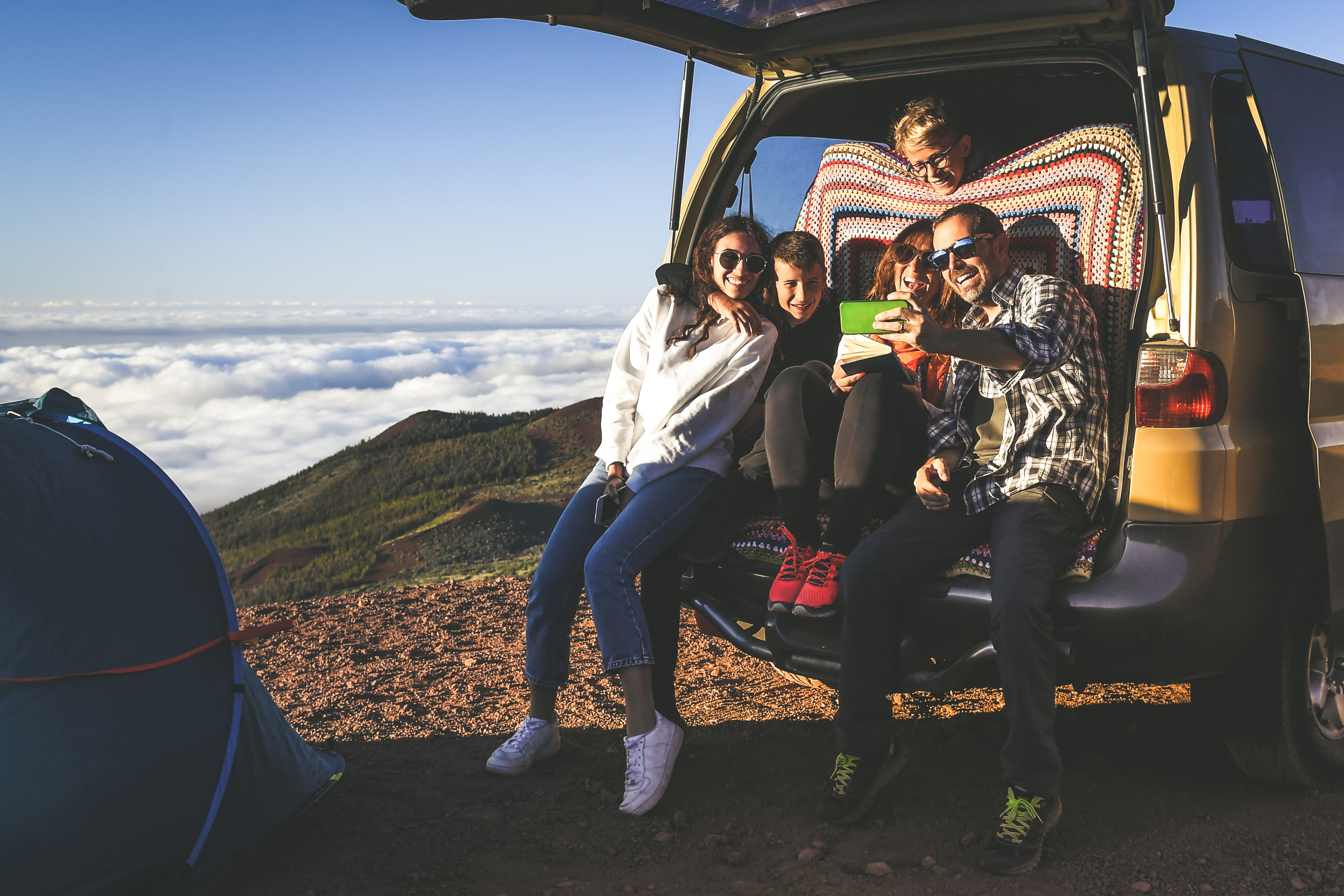 Group,Of,Smiling,People,Taking,Selfie,With,Smartphone.,Family,Activity